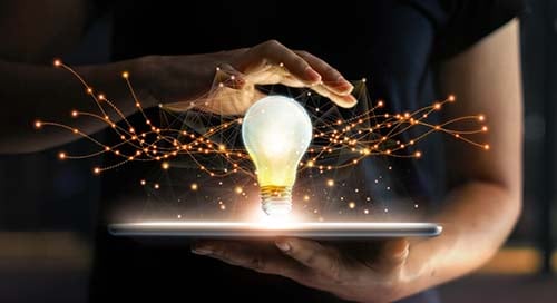 Lightbulb atop a tablet