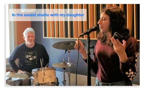 Kevin Arsham in the sound studio with his daughter.